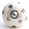White silver spots knob
